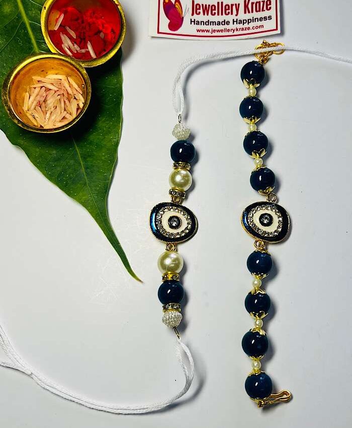 Dramatic Evil Eye Couple Rakhi